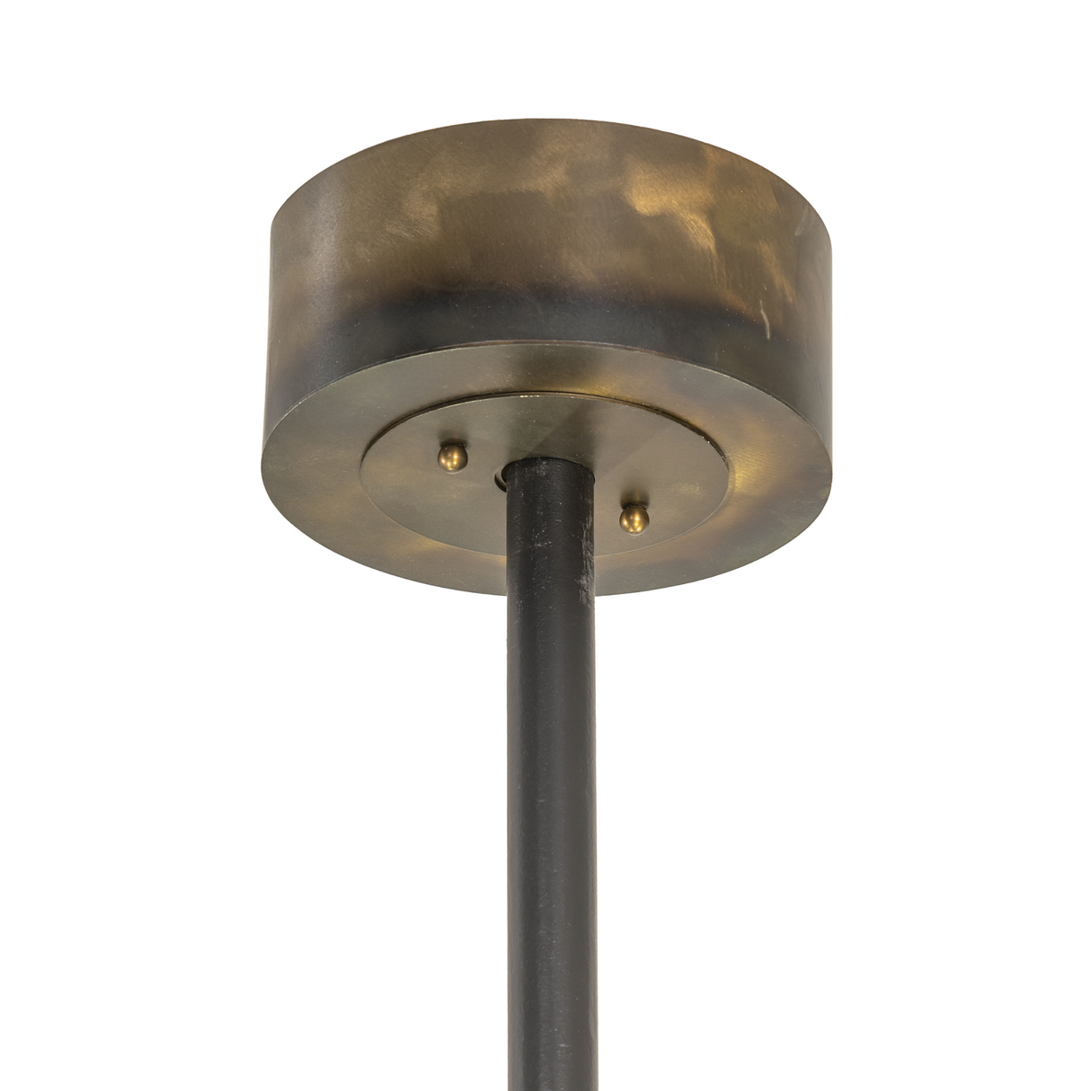 Close-up of ceiling canopy in burnished antique copper finish with suspension rod.