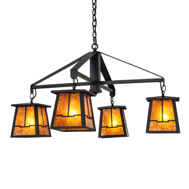 Lit view of four-light chandelier with amber mica shades illuminated.