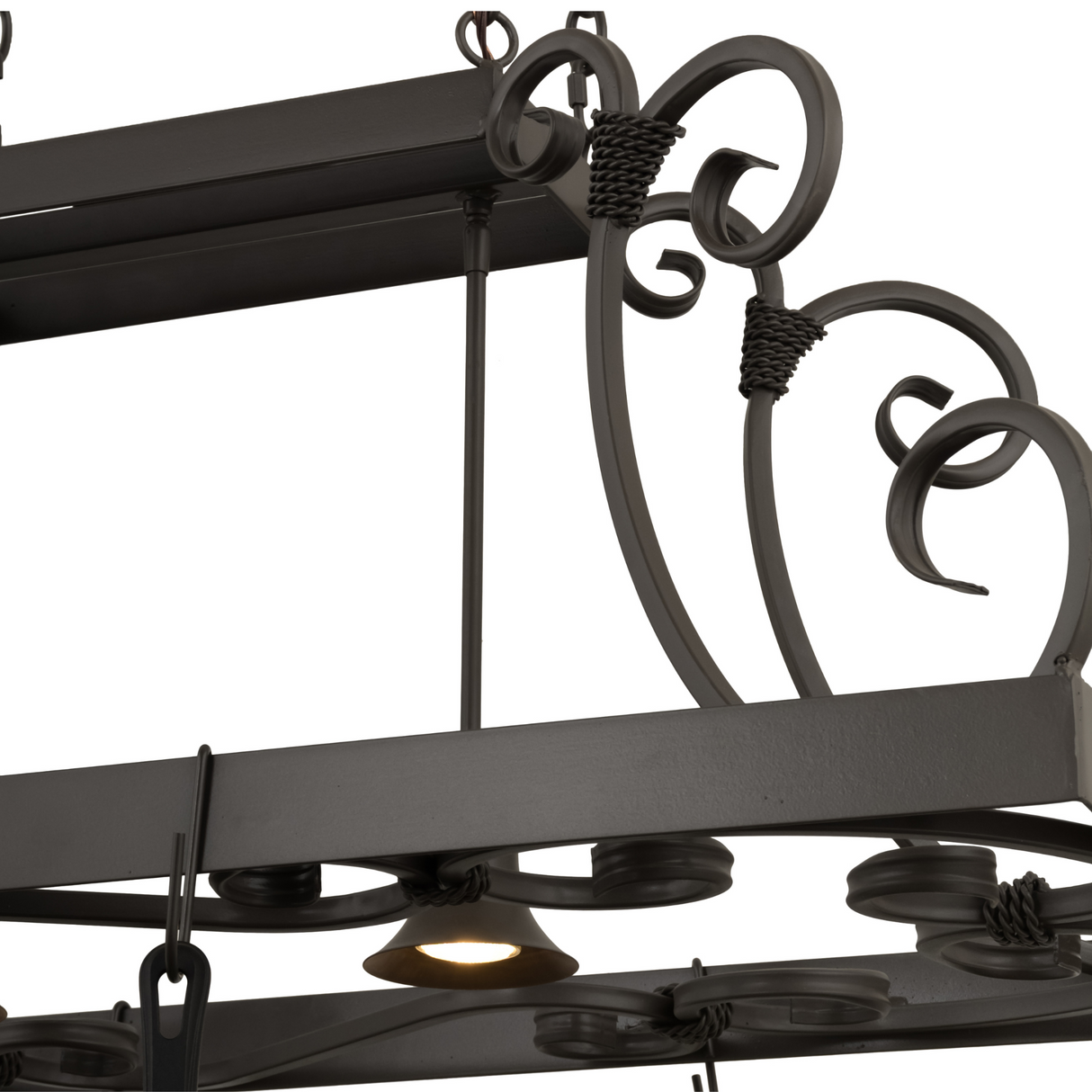 Close-up of scroll accents and light fixture on Caiden pot rack.