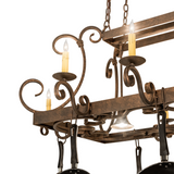 Close-up of scroll detail and glowing faux candlelight.