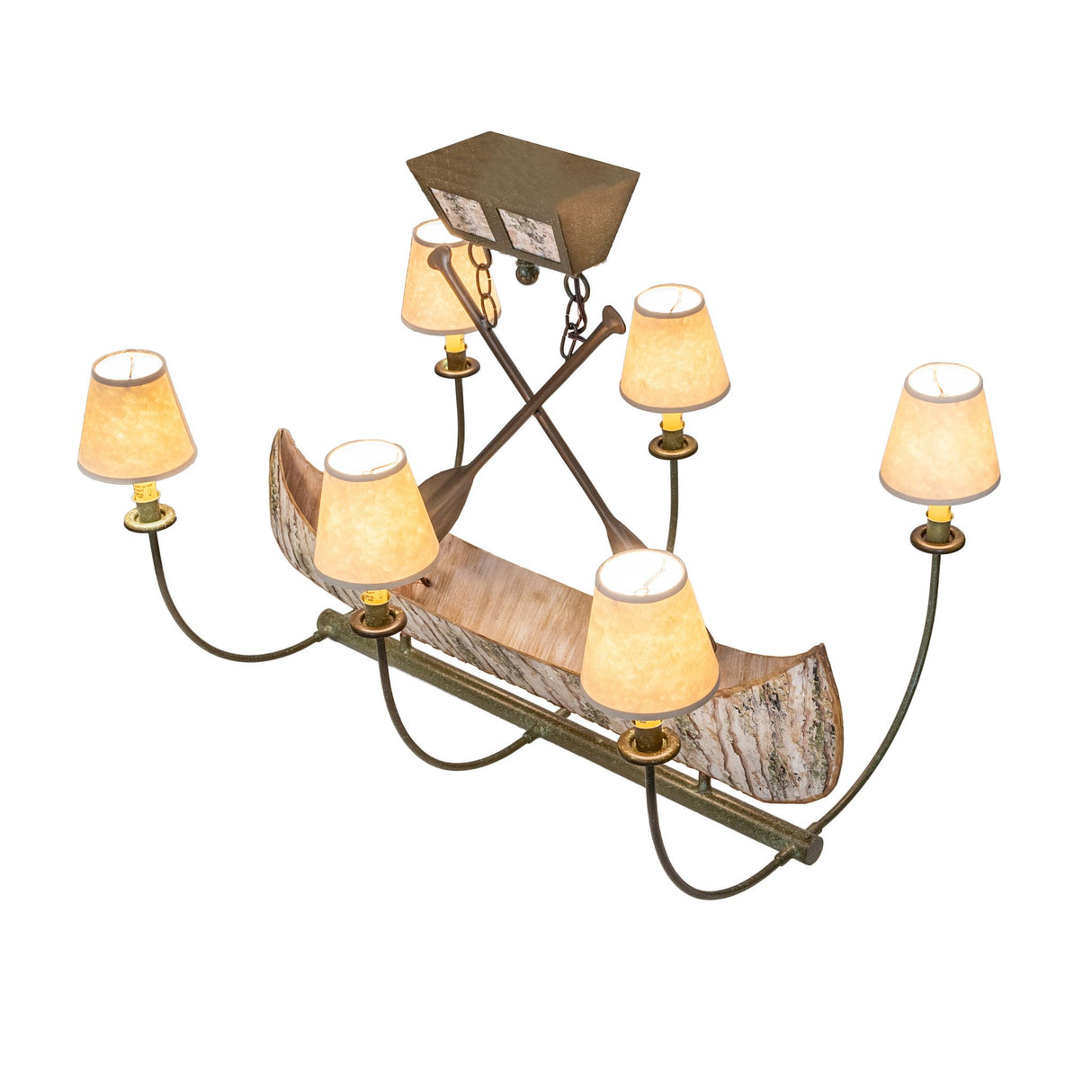 Top-down view revealing shade layout, crossed supports, and balanced canoe silhouette.