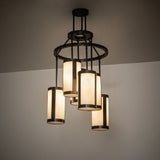 Cartier 6 light chandelier lit in a room setting showing warm ambient illumination.