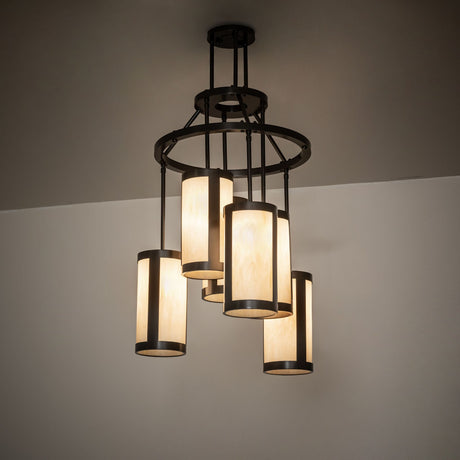 Cartier 6 light chandelier lit in a room setting showing warm ambient illumination.