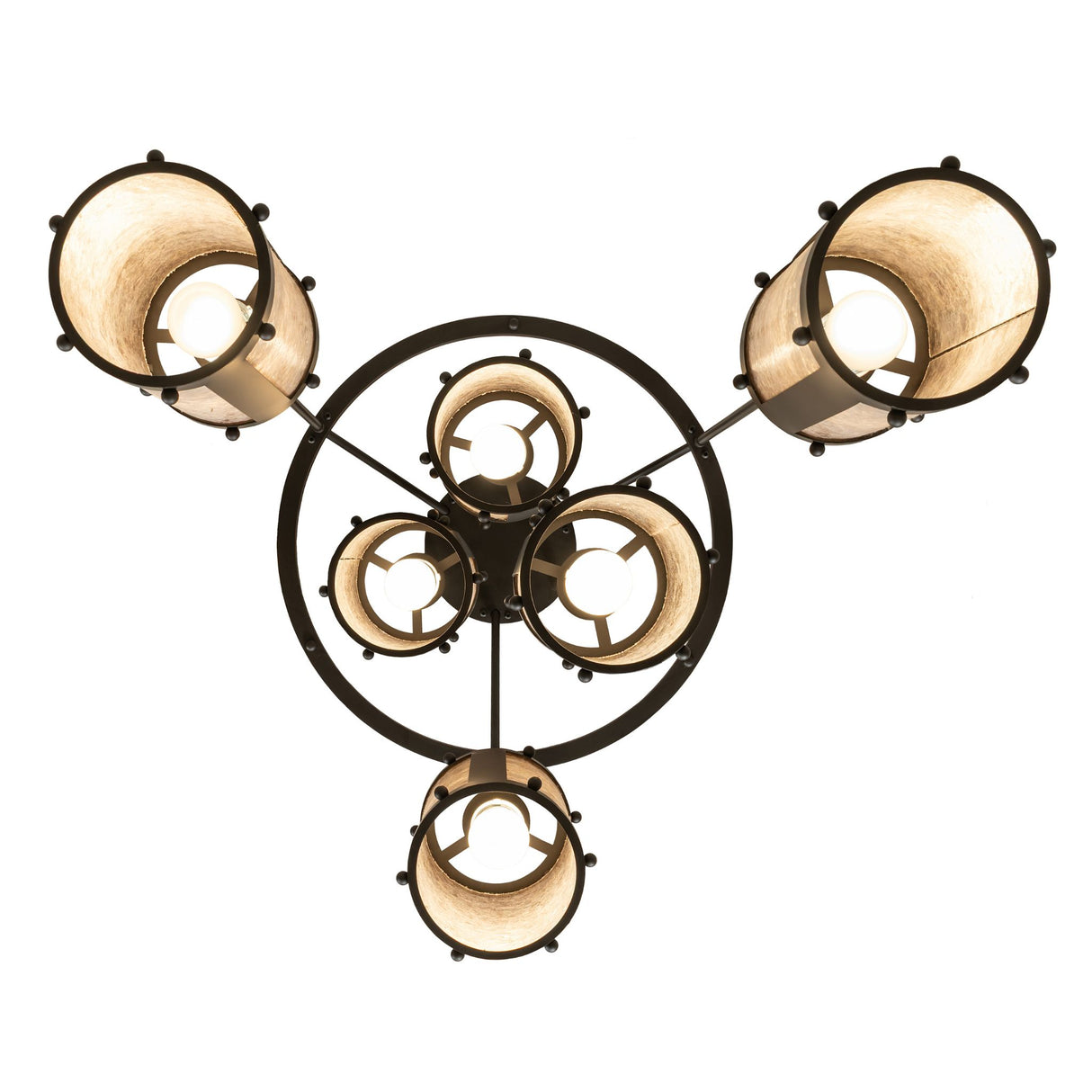 Bottom upward view showing the circular frame and cylindrical mica shades of the Cartier chandelier.