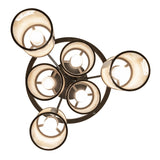 Bottom view of the cartier chandelier showing circular frame and internal bulb placement.