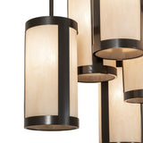 Close-up detail of an Idalight cylinder shade on the chandelier.