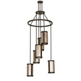 Unlit view of the Cartier chandelier’s bronze frame and silver mica diffusers.