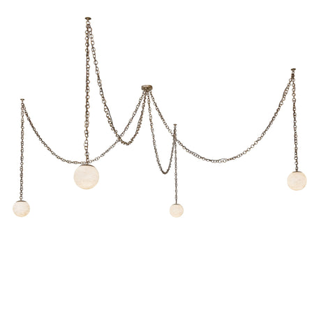 Lit view of 4 light chandelier with alabaster glass globes and brass chains.