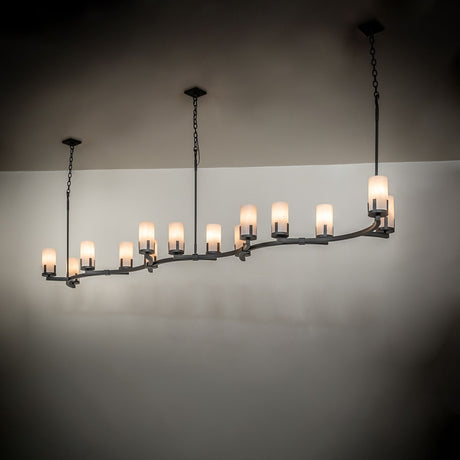 Cero 14-light oblong chandelier installed over dining area with warm ambient illumination.