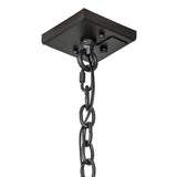 Closeup of square ceiling canopy with chain suspension in charred Iron finish.