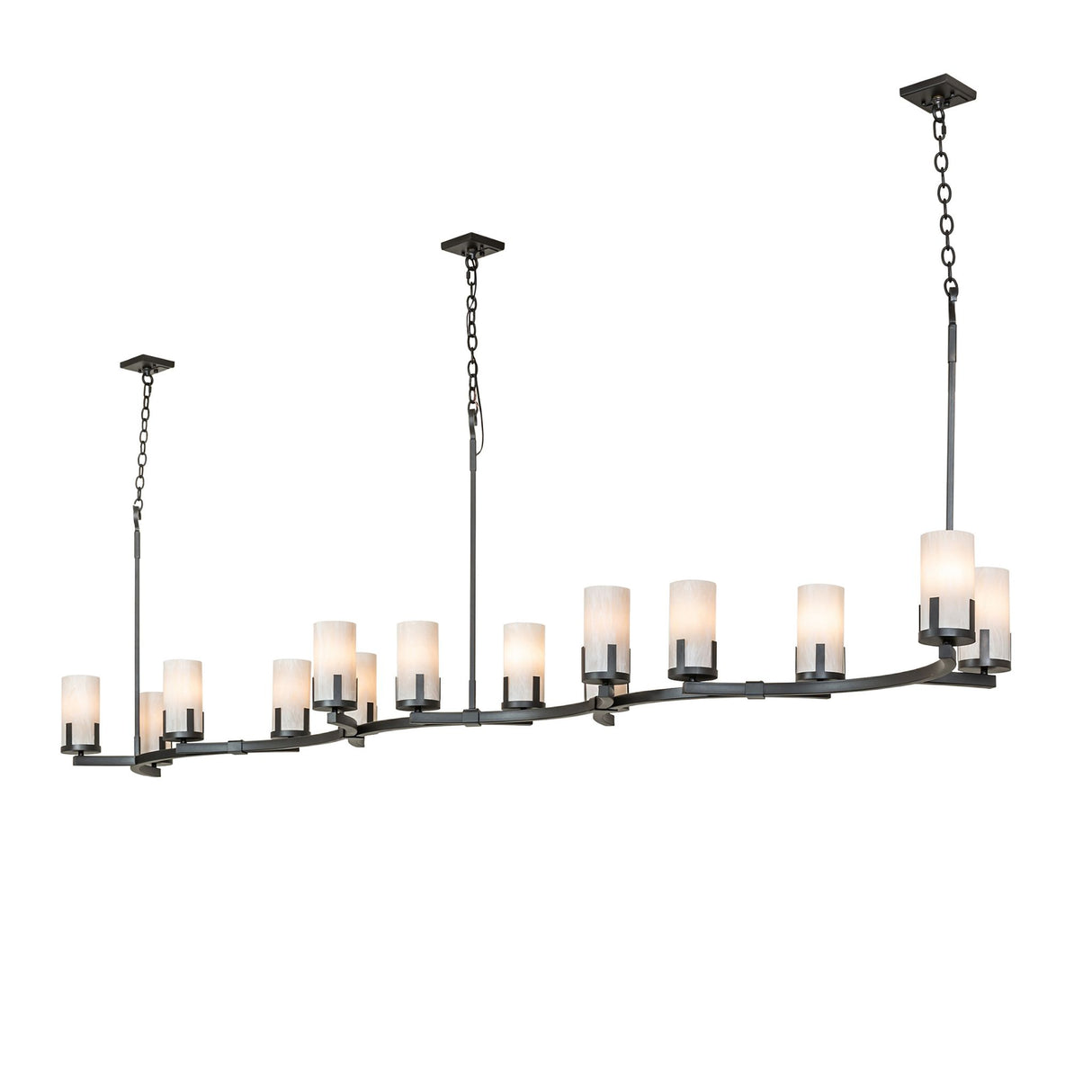Lit view of chandelier with fleshtone glass cylinders and charred iron frame.
