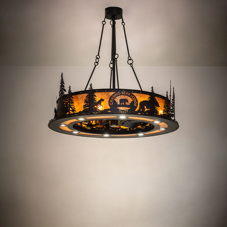 Chasing Bear Lodge chandelier fan lighting a rustic interior room.
