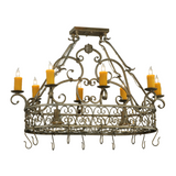 Side view of Cira chandelier illuminated, showing graceful iron scrolls.