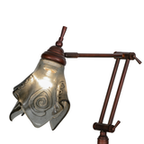 Close-up of lit Metro Fusion glass shade showing smoke swirl pattern.