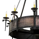 Closeup of hammered copper finish and candlelight details.