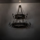 Dark Room view highlighting the Costello chandelier with upper lights illuminated.