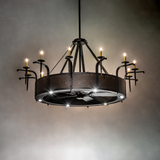 Illuminated chandelier in a softly lit room showcasing rustic glow.