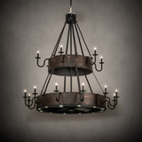 Ambient room view showing chandelier glowing warmly in rustic setting.