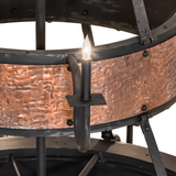 Close-up of candlelight arm with hammered copper finish.