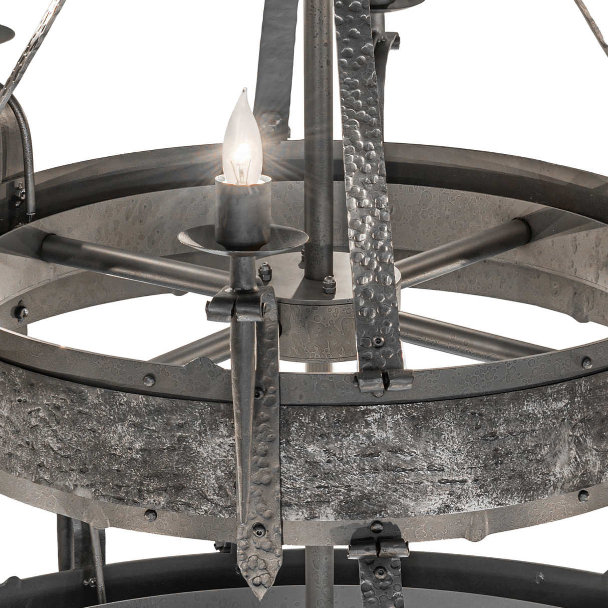 Detailed view of candle-style light fixture on Costello Two Tier chandelier fan.