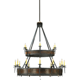 Focused view on tier edge showing metal texture and candlelight detail.