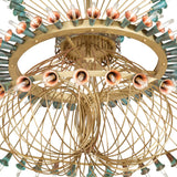Close-up of Coyle chandelier showing brass wiring curves and copper socket details.