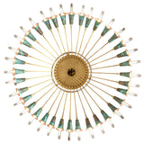 Bottom view of Coyle 36 light chandelier showing circular brass hub and radiating arms.
