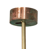 Closeup of chandelier copper canopy with verdigris patina finish and brass stem.