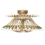 Side view of Coyle chandelier showing layered brass tubing and light arrangement.
