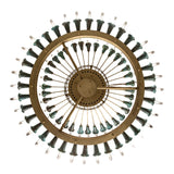 Underneath view of 72-light chandelier highlighting circular brass frame and socket cup layout.