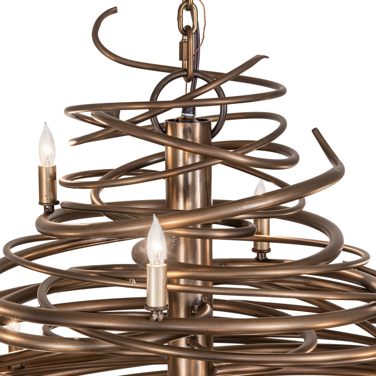 Close-up of upper section showing intertwined iron spirals and candle-style bulb holders.