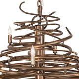 Close-up of upper section showing intertwined iron spirals and candle-style bulb holders.