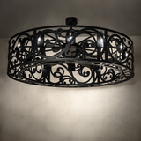 Dean chandelier fan casting ambient light in elegant room setting.