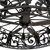 Close-up of Dean chandelier fan motor and decorative scroll detailing.