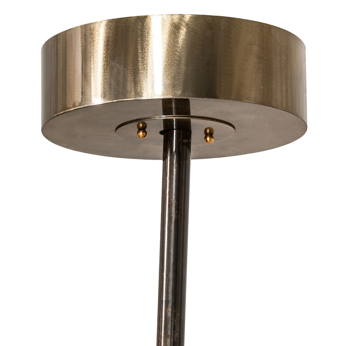 Close-up of Donner chandelier ceiling canopy and suspension rod in brass finish.