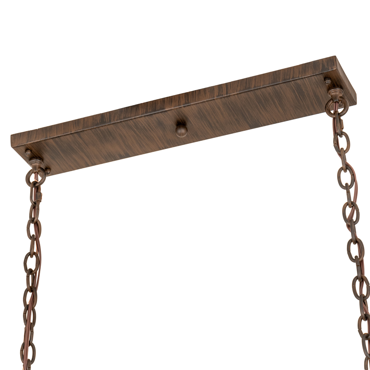 Detailed view of ceiling canopy and suspension chains.