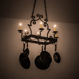 Elara 6 Light Pot Rack chandelier glowing warmly in dark setting.