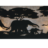 Close-up of elephant and tree cutout detail on silver mica panel.