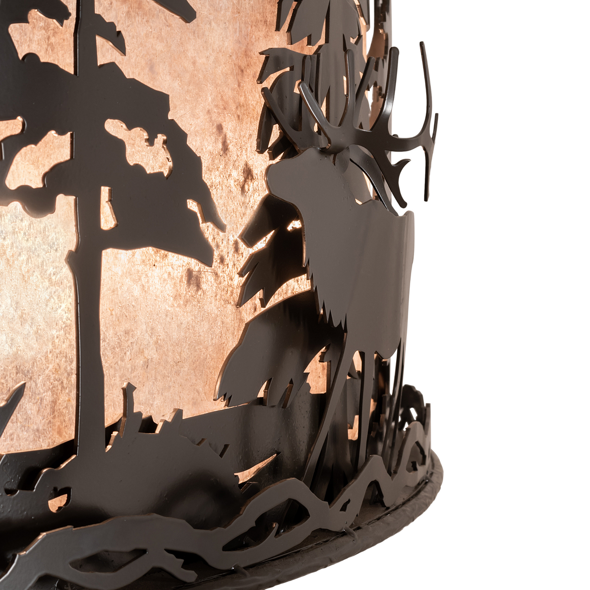 Close-up of forest metalwork with elk and pine tree silhouettes in bronze finish.