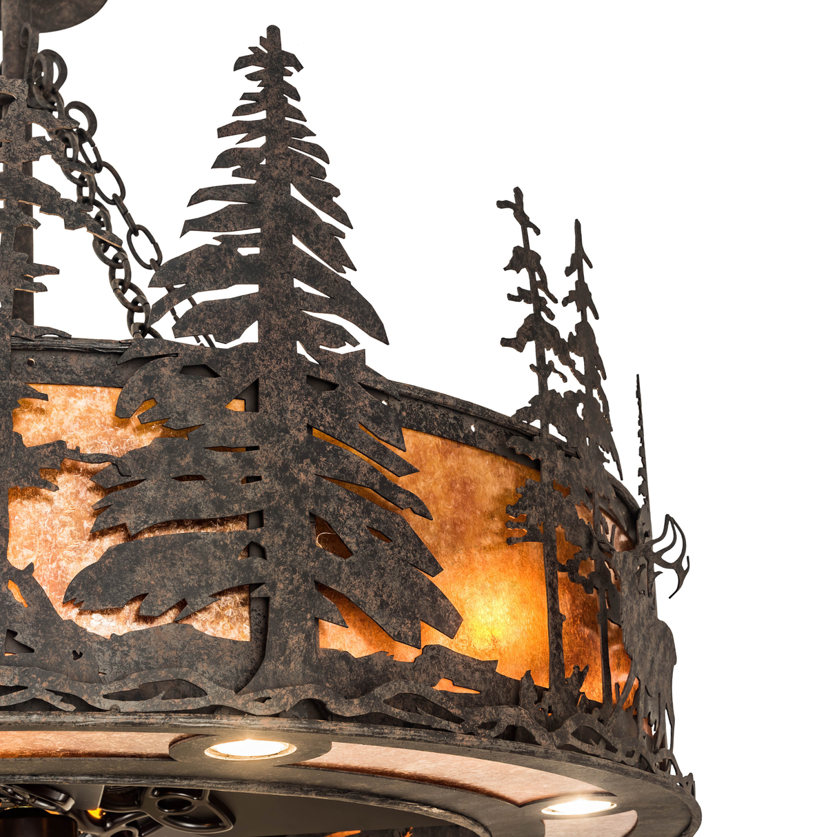 Close-up showing hand-forged pine tree detail with rustic finish.