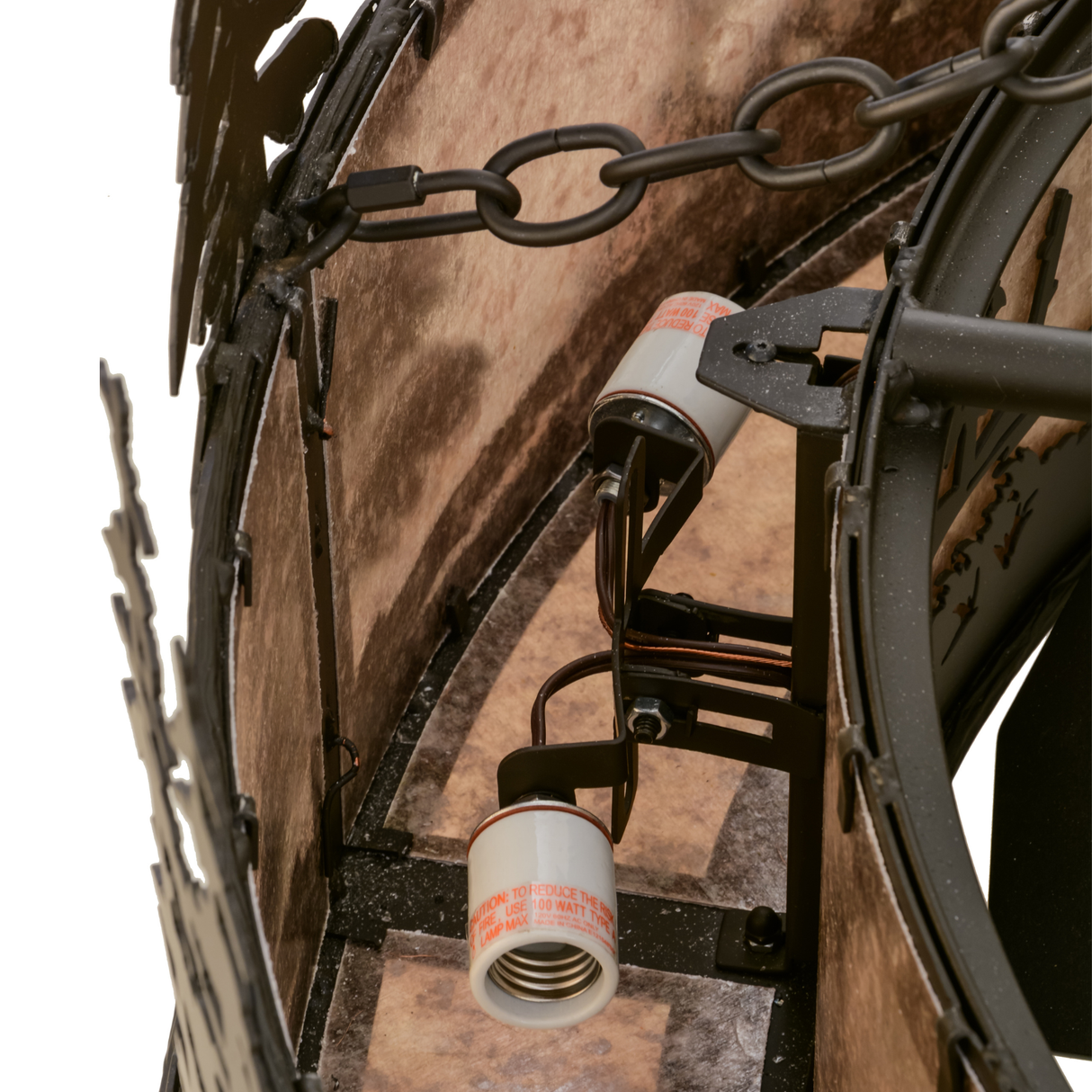 Interior view showing lamp sockets and metal framework.