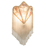 Illuminated Fabric & Fringe Floral Night Light with an ivory floral fabric shade and beaded fringe.
