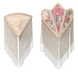 Unlit floral night lights with fabric and fringe trim.