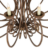 Closeup of Fernando chandelier candle cup and faux candlelight bulb detail.
