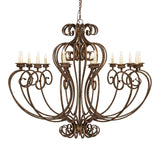 Side view of Fernando 14 light chandelier showing curved iron scroll arms.