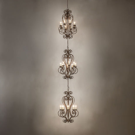 Fernando three-tier chandelier lit in ambient room lighting showing vertical glow.