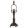front view of footed lamp base with harp for a versatile lighting setup.