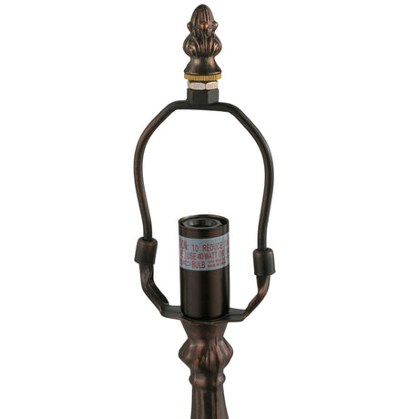 top view of footed lamp base highlighting its harp attachment and structure.