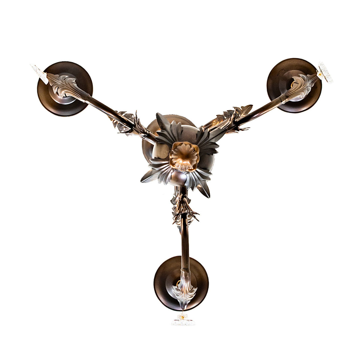 Bottom view of chandelier highlighting three-arm symmetry and metal detailing.