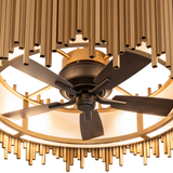 Close-up of fan hub and metallic gold rods with elegant architectural detailing.